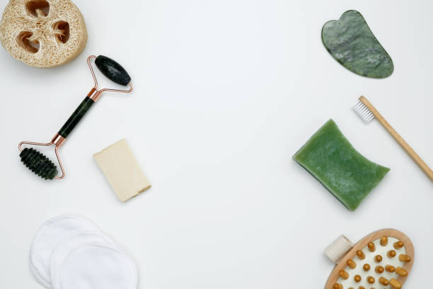 istock Eco-friendly beauty essentials, including soap, bamboo toothbrush, marble face roller, embodying a sustainable self-care concept 2206224586