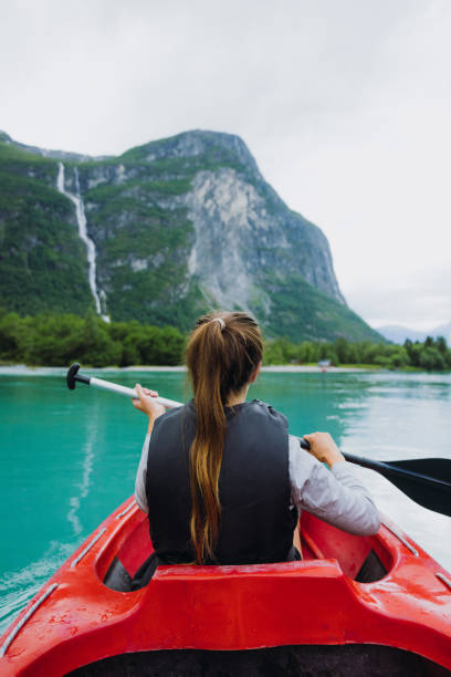 istock Cheerful Weekend Canoeing at Idyllic Place 2206225268