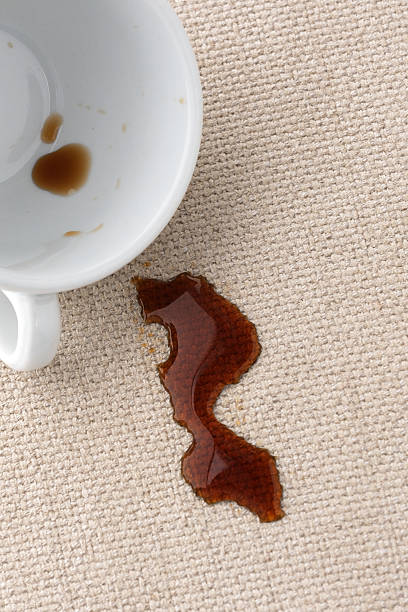 istock Dirty stains from spilled coffee on textile upholstery. 2206233571