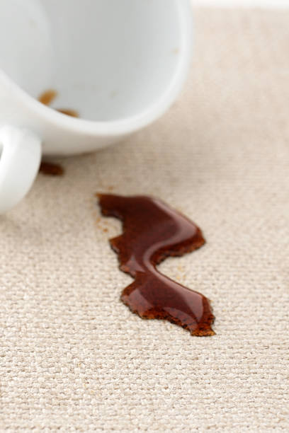 istock Dirty stains from spilled coffee on textile upholstery. 2206233593