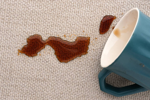 istock Dirty stains from spilled coffee on textile upholstery. 2206234154