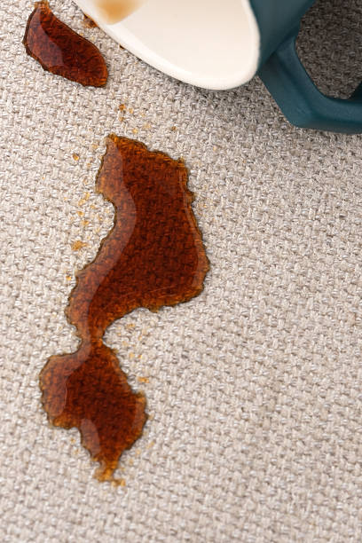 istock Dirty stains from spilled coffee on textile upholstery. 2206234188