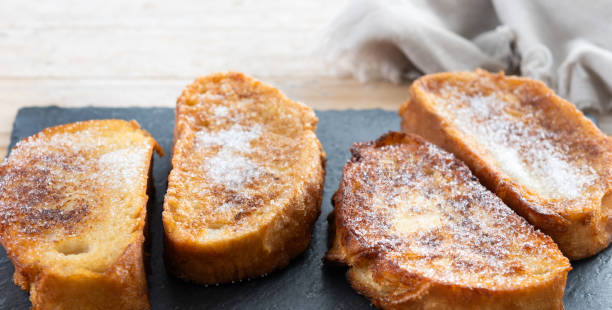 istock Traditional Spanish torrijas for Holy Week on wooden table 2206237357