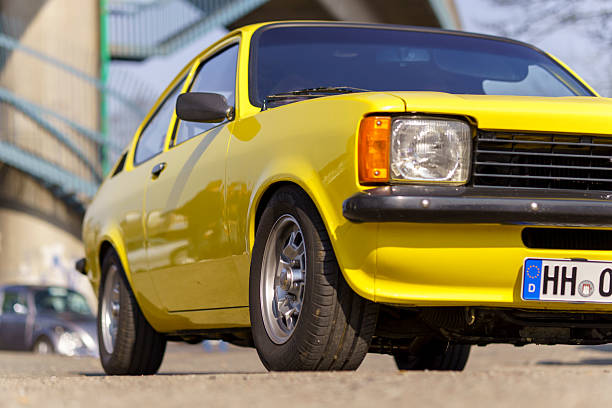 Hamburg, Germany - March 10. 2025: Yellow Opel Kadett parked in low-angle front view, Hamburg