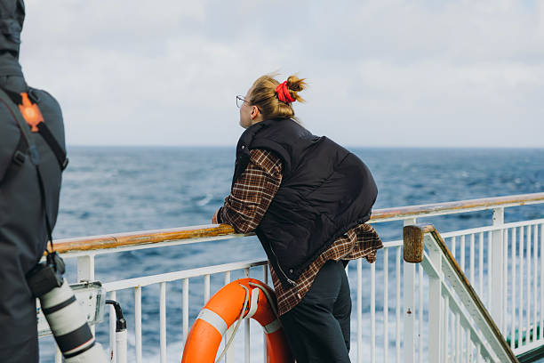 istock Traveller Crossing Sea by Ferry Admiring Dramatic Ocean Views 2206245427