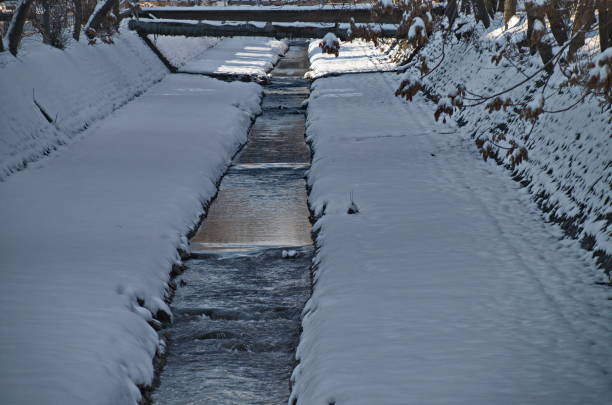 Cityscape in newly fallen snow in sunny weather.