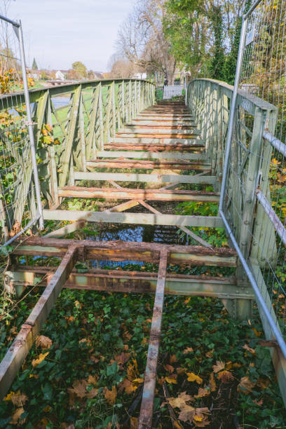 istock Bridge with a lot of rust and leaves on it 2206246501