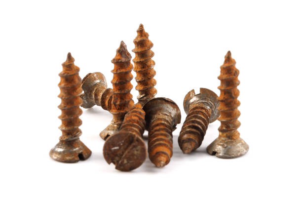 istock A bunch of rusty screws isolated on white background. 2206246653