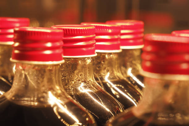 istock A closeup view featuring bottles that have bright red caps on them 2206246844