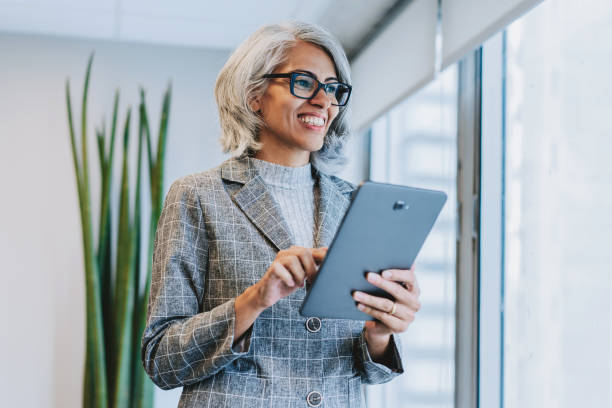 istock Portrait of a mature woman using a digital tablet 2206249491