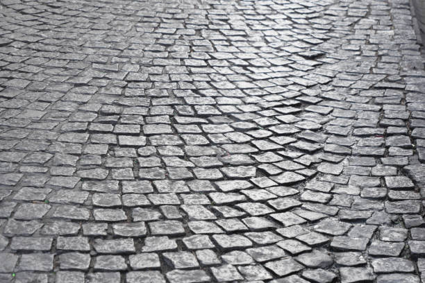 istock Textured Cobblestone Pavement Found in an Urban Setting and Environment 2206249552