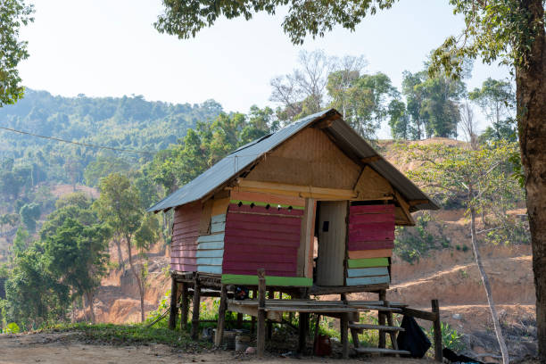 istock Wooden house on stilts on observation deck Samet Nangshe viewpoint, province Phang Nga, Thailand. Islands in bay of Andaman sea 2206250229