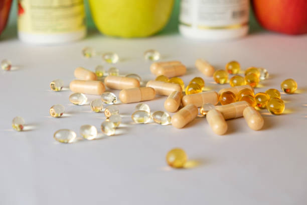 istock Vibrant assortment of nutritional supplements on a white background 2206250254