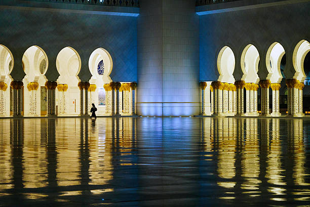 Abu Dhabi, UAE – November 21, 2024: A captivating editorial image of the Sheikh Zayed Grand Mosque’s courtyard at dusk.