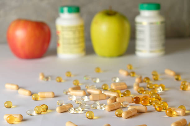 Pills and a doctor in the background