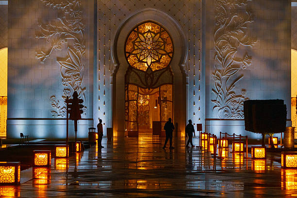 Abu Dhabi, UAE – November 21, 2024: A captivating editorial image of the Sheikh Zayed Grand Mosque’s courtyard at dusk.
