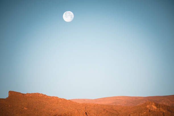 Full moon and desert mountains, Morocco