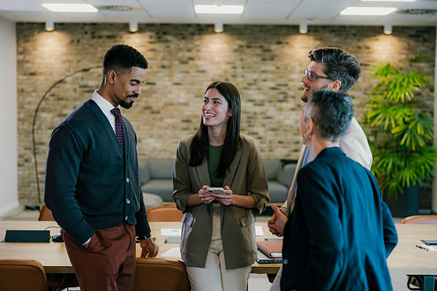 istock Business team collaborating and discussing ideas in modern office 2206254295