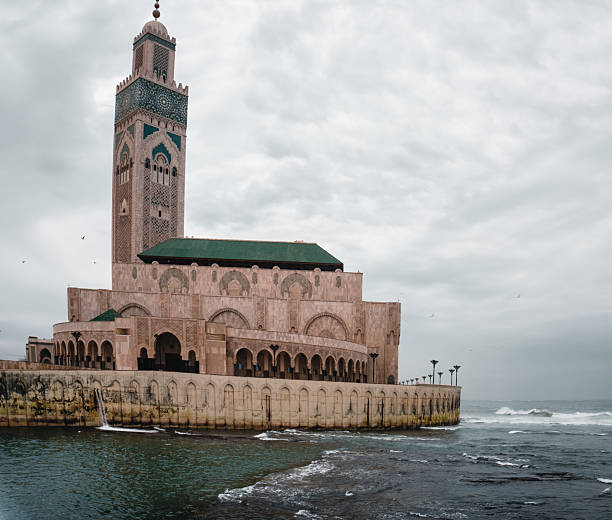 istock Minaret tower and mosque above sea 2206255922