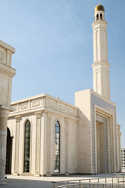istock Magnificent Mosque with Minaret Under Blue Sky 2206256250