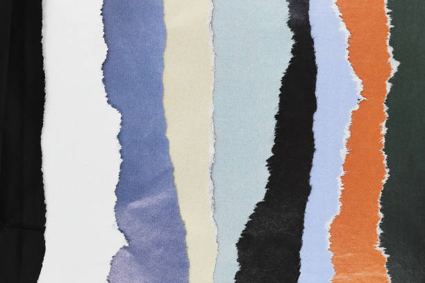 Graphic resources. Various colors torn in strips paper background with copy space