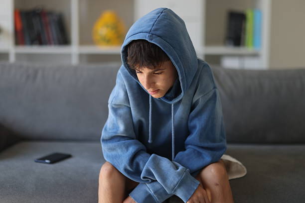 istock Pensive sad boy teenager 2206259733