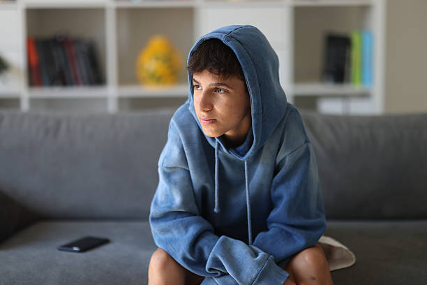 istock Pensive sad boy teenager 2206263059