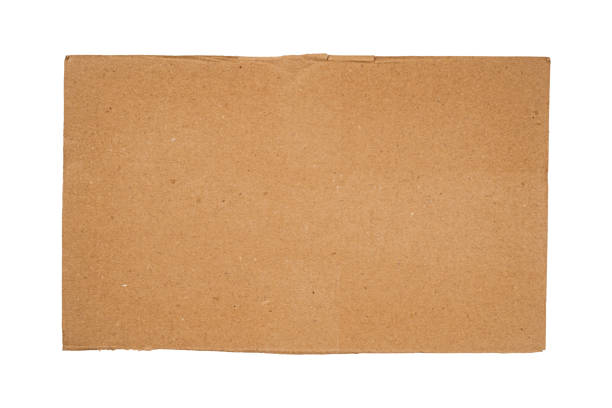 istock A rectangular piece of brown cardboard with copy space for text or design is isolated. Close-up. 2206268814