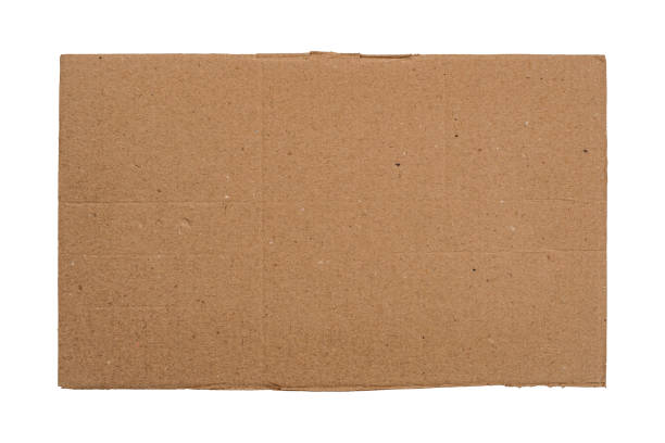 istock A rectangular piece of brown cardboard with copy space for text or design is isolated. Close-up. 2206268816