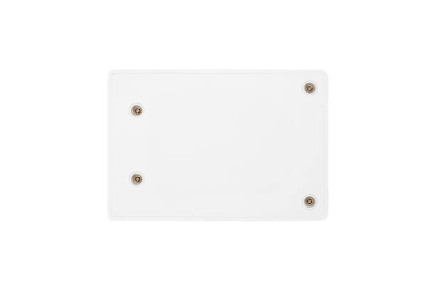 istock White rectangular plastic cover with four metal screws in the corners is isolated. Close-up. 2206268823