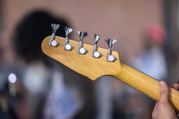 Bass headstock at a concert