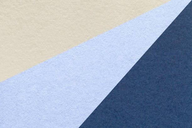 istock Texture old craft beige, sky and navy blue paper background, macro. Structure vintage denim cardboard with gradient 2206277592