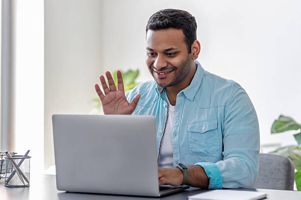 istock Happy businessman having online video call home 2206278820
