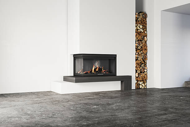 istock Empty Scandinavian-style room with modern fireplace, stacked firewood, concrete floor, and ocean-view window. Minimalist and natural design. 3D rendering. 2206281573