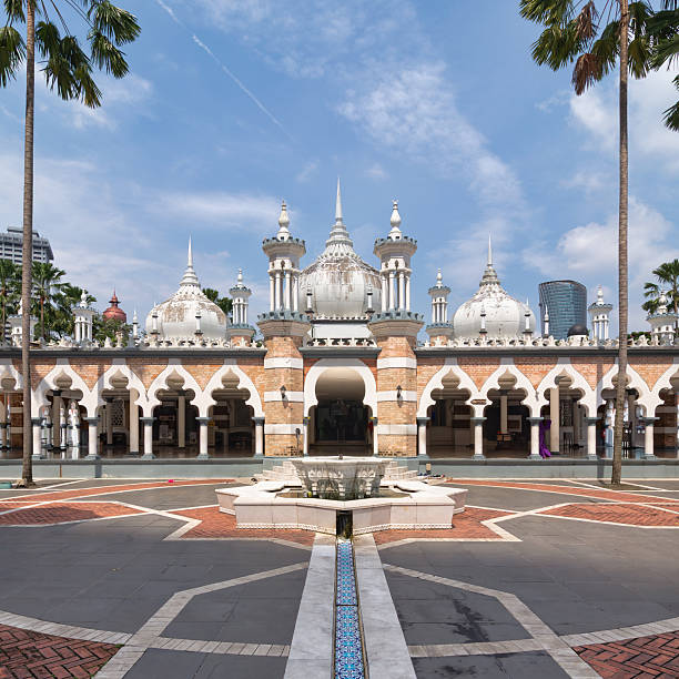 Explore Sultan Abdul Samad Jamek Mosque in Kuala Lumpur with breathtaking architecture and serene surroundings
