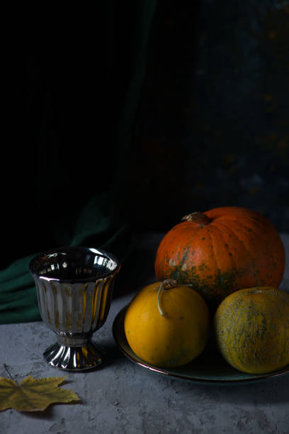 autumn still life pumpkin in dramatic style.