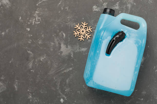 istock Can with antifreeze on concrete background, top view 2206288293