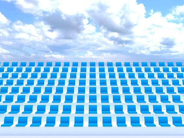 Rows of empty blue stadium seats stretch towards a cloudy sky, creating a sense of anticipation for an upcoming event. 3d rendering illustration