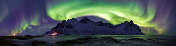 istock Beautiful northern lights in Stokksnes (South Iceland) 2206292107