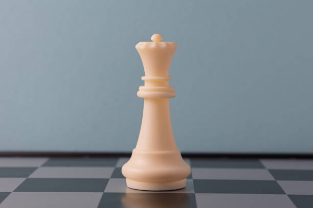 istock White queen chess piece standing on a chessboard 2206295739