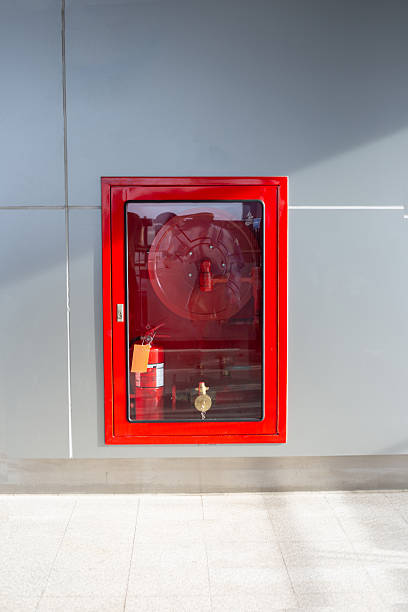 istock Wall-mounted fire hose cabinet with a glass door 2206317698