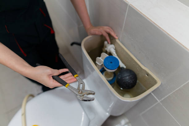 istock close up hand with tools check and repair water closet leaking issue stock photo 2206321027