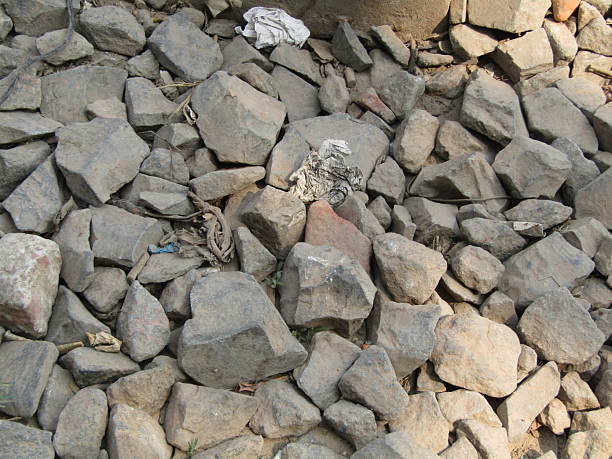 istock Dark dirty stones on the ground 2206325443