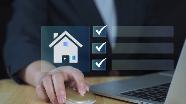 istock Real estate checklist concept, A professional organizing real estate tasks on a laptop using a digital checklist, streamlining property management and housing investments with innovative tools. 2206327945