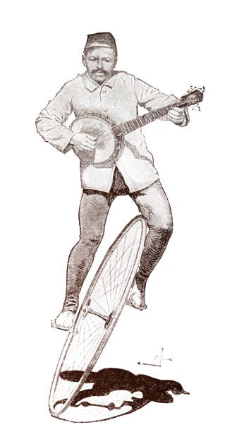 istock Bicycle sport and performances, Artist on a unicycle plays mandolin 2206333313