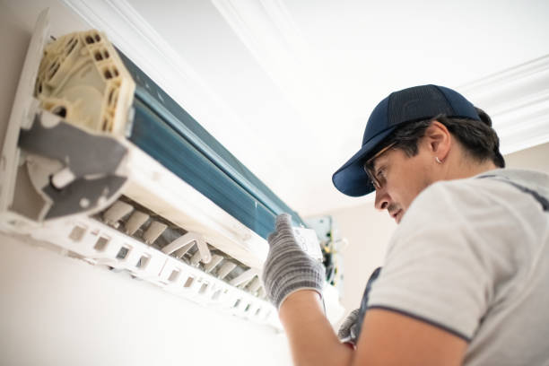 istock Technician repairing air conditioner at home 2206342792
