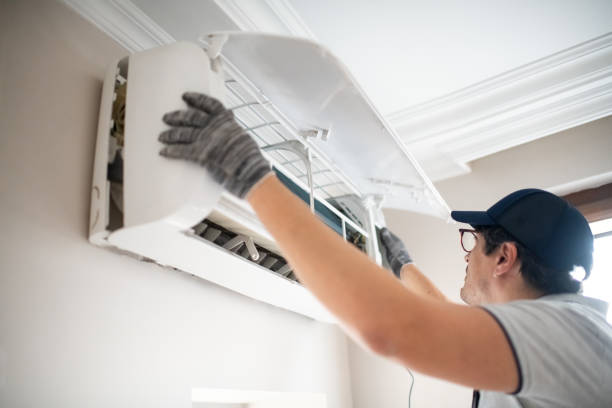 istock Technician repairing air conditioner at home 2206342793