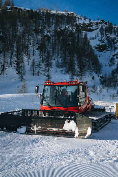 istock Snow groomer on ski hill 2206351189