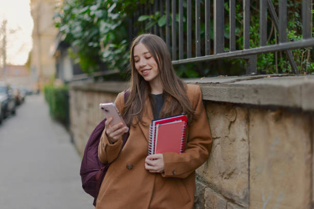 istock Female tourist student on city streets 2206355265