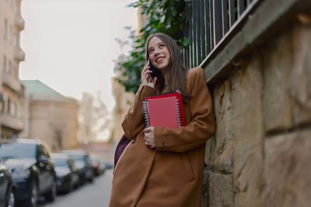 istock Female tourist student on city streets 2206355270